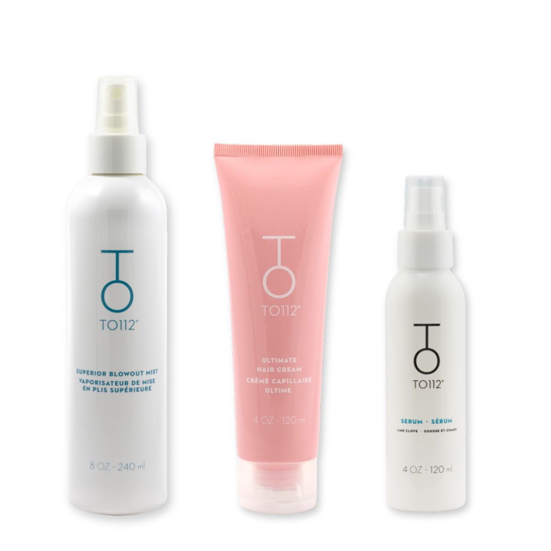 Three heat protectant hair care products - Superior Blowout Mist - Ultimate Hair Cream - Serum - from the brand TOI12 on a white background